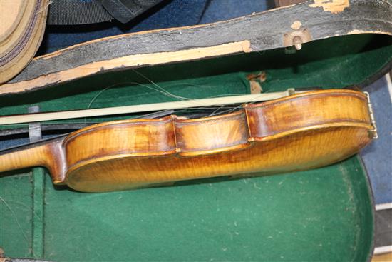A full sized cased violin with bow
